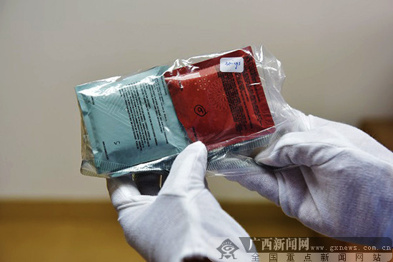 桂林市首例邮包走私大麻烟油案开庭审理
